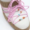 Botas de ante con cuentas en color miel y arena de Moon Boot X Guest in Residence Icon Low