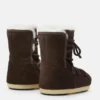 Botas Evx de gamuza y piel de oveja en marrón oscuro Botas Evx de gamuza y piel de oveja en marrón oscuro