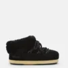 Mules de gamuza negra Evx